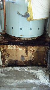 a rusted out water heater can ruin a Cerritos garage floor